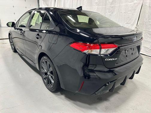 Midnight Black Metallic 2025 Toyota Corolla Hybrid SE