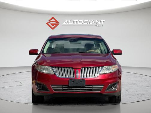 Red 2010 Lincoln MKS Base