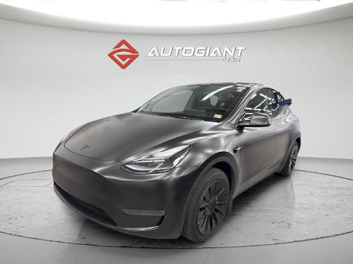 Solid Black 2025 Tesla Model Y Long Range Dual Motor Rear-Wheel Drive