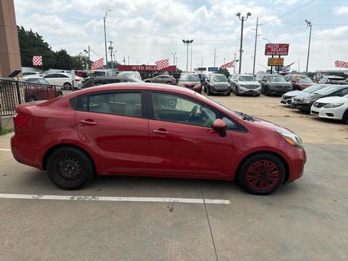 Red 2015 Kia Rio LX