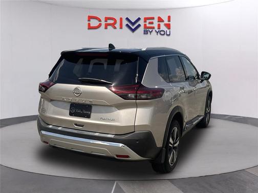 Champagne Silver Metallic/Super Black 2023 Nissan Rogue Platinum