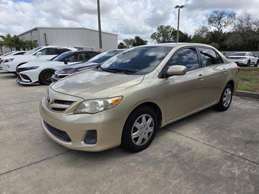 Sandy Beach Metallic 2011 Toyota Corolla LE