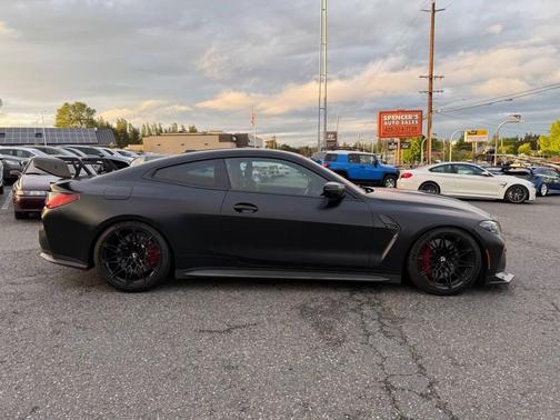 Black Sapphire Metallic 2024 BMW M4 Competition xDrive