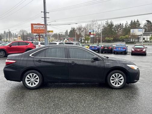 Midnight Black Metallic 2016 Toyota Camry Hybrid LE