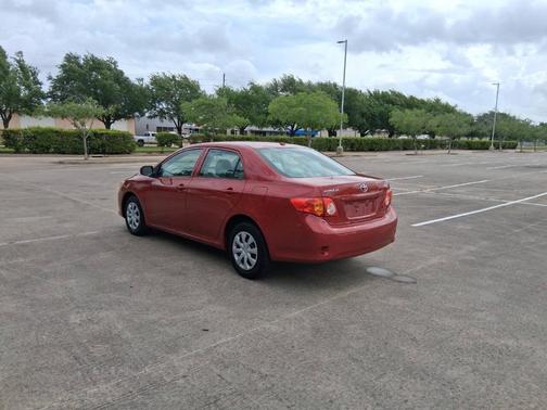 Barcelona Red Metallic 2010 Toyota Corolla LE