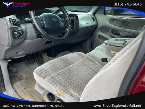 Red 1997 Ford F-150 Long Bed