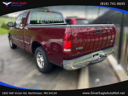 Red 1997 Ford F-150 Long Bed