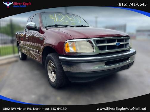 Red 1997 Ford F-150 Long Bed