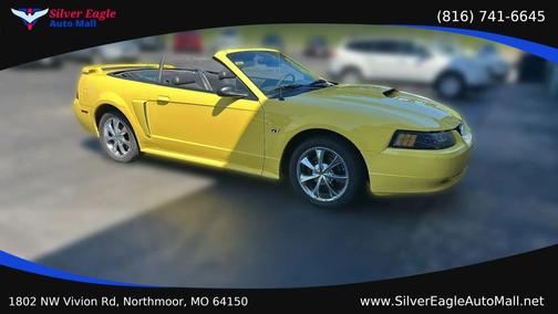 Yellow 2003 Ford Mustang GT