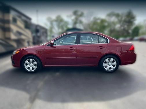 Red 2009 Kia Optima LX