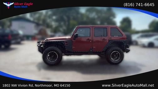 Red 2007 Jeep Wrangler Unlimited Sahara