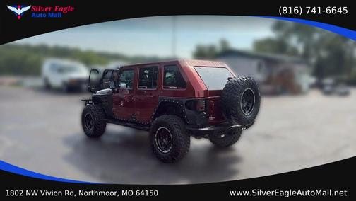 Red 2007 Jeep Wrangler Unlimited Sahara