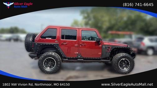 Red 2007 Jeep Wrangler Unlimited Sahara