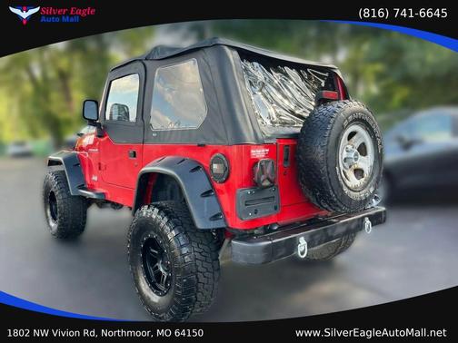 Red 1997 Jeep Wrangler Sport