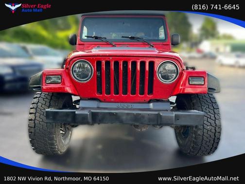 Red 1997 Jeep Wrangler Sport