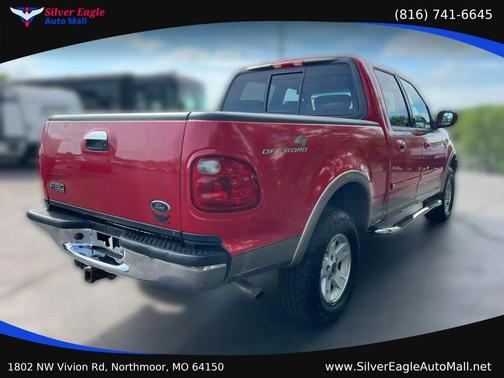 Red 2002 Ford F-150 King Ranch SuperCrew
