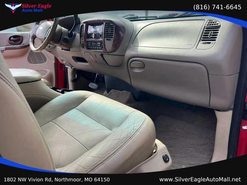 Red 2002 Ford F-150 King Ranch SuperCrew