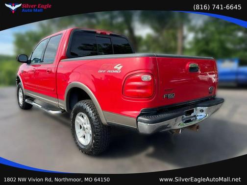 Red 2002 Ford F-150 King Ranch SuperCrew