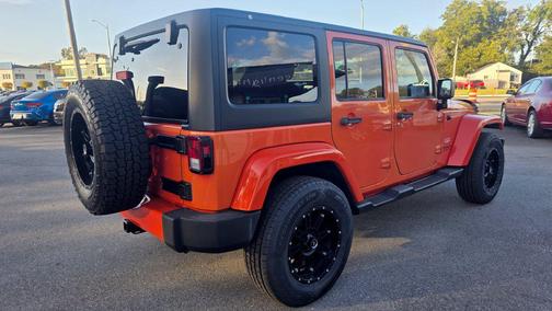 Sunset Orange 2015 Jeep Wrangler Unlimited Sahara