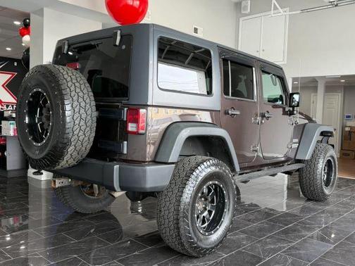Brown 2013 Jeep Wrangler Unlimited Sport