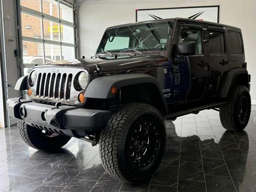Brown 2013 Jeep Wrangler Unlimited Sport
