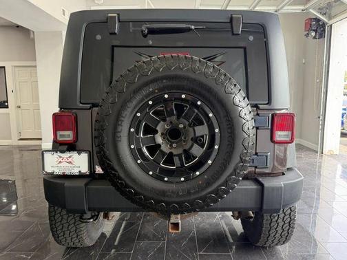 Brown 2013 Jeep Wrangler Unlimited Sport