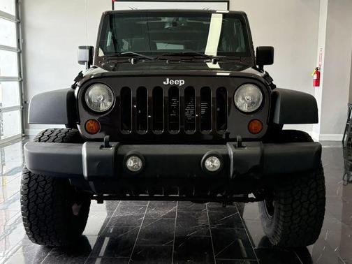 Brown 2013 Jeep Wrangler Unlimited Sport