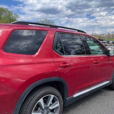 Maroon 2023 Honda Pilot AWD Elite