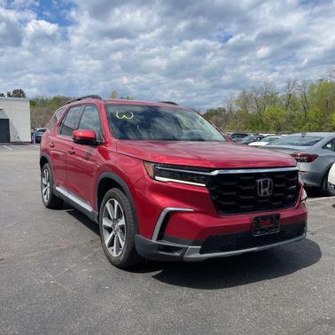 Maroon 2023 Honda Pilot AWD Elite