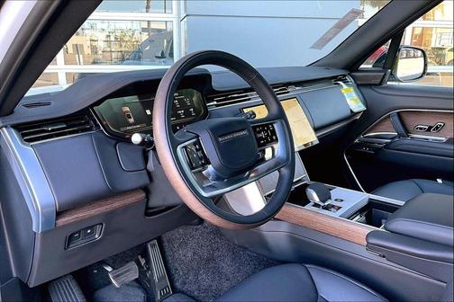 Black 2025 Land Rover Range Rover P550e SE