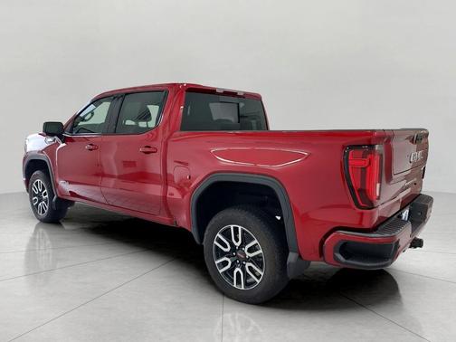 Volcanic Red Tintcoat 2025 GMC Sierra 1500 AT4
