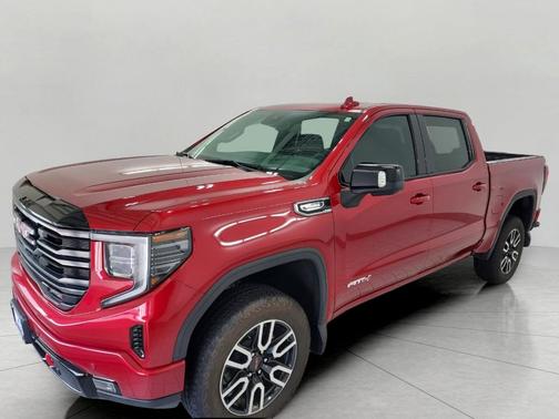 Volcanic Red Tintcoat 2025 GMC Sierra 1500 AT4