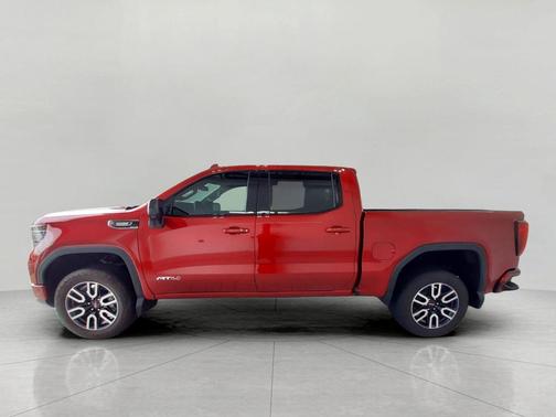 Volcanic Red Tintcoat 2025 GMC Sierra 1500 AT4