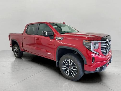 Volcanic Red Tintcoat 2025 GMC Sierra 1500 AT4