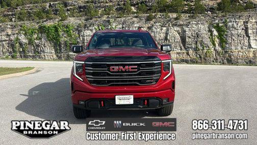 Volcanic Red Tintcoat 2026 GMC Sierra 1500 AT4