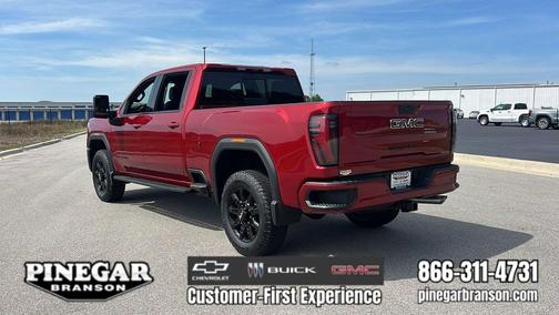 Volcanic Red Tintcoat 2026 GMC Sierra 2500 AT4