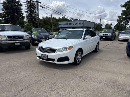 White 2010 Kia Optima LX