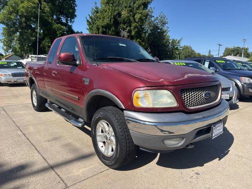 Red 2003 Ford F-150 XLT SuperCab