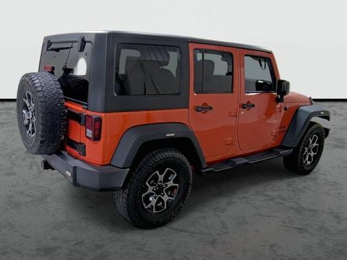 Sunset Orange Pearlcoat 2015 Jeep Wrangler Unlimited Sport