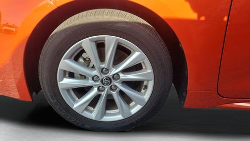 Orange 2025 Toyota Corolla Hatchback SE