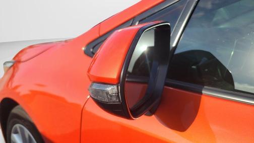 Orange 2025 Toyota Corolla Hatchback SE