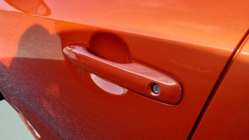 Orange 2025 Toyota Corolla Hatchback SE