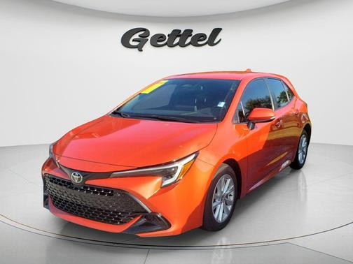 Orange 2025 Toyota Corolla Hatchback SE