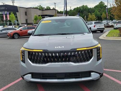 Ceramic Silver 2026 Kia Carnival Hybrid EX