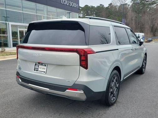 Ivory Silver 2026 Kia Carnival Hybrid SX