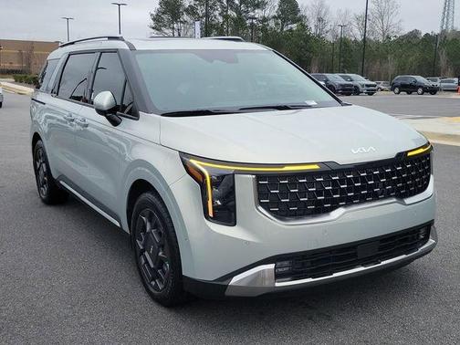 Ivory Silver 2026 Kia Carnival Hybrid SX