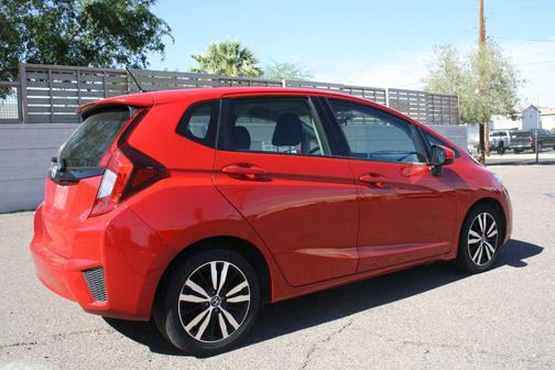 Red 2016 Honda Fit LX