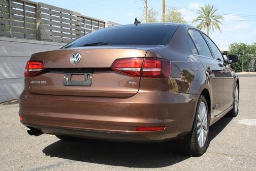 Brown 2016 Volkswagen Jetta 1.8T SEL