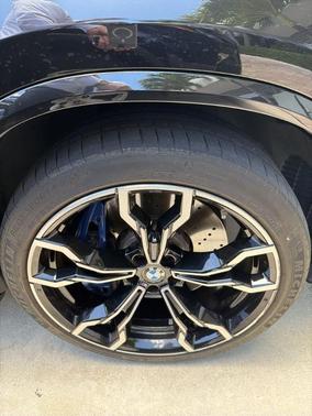 Black Sapphire Metallic 2024 BMW X4 M AWD