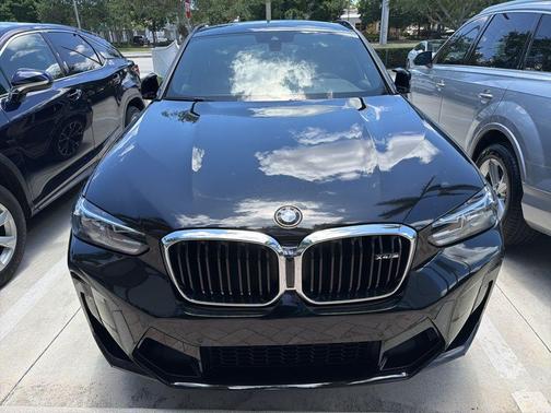 Black Sapphire Metallic 2024 BMW X4 M AWD